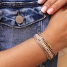 Pulsera doble de seda beige con piezas de bronce