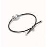 Pulsera de hilo negro con perla shell fornitura bañada en plata de ley.