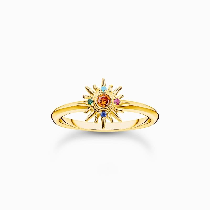 Anillo con diseño de sol bañado en oro y piedras de colores