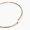 Gargantilla de acero dorado con cierre magnético.