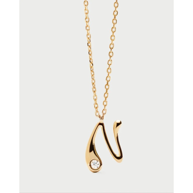Collar de plata de ley con baño de oro y colgante de inicial N en suaves líneas curvas