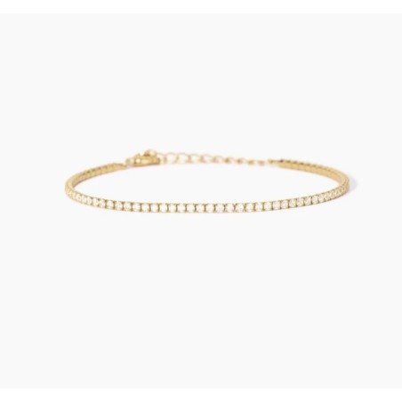 Pulsera fina de tenis en plata chapada en oro con circonitas.