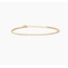 Pulsera fina de tenis en plata chapada en oro con circonitas.