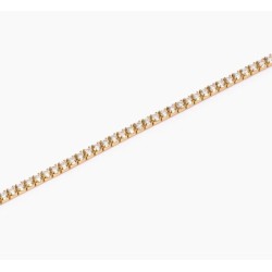 Pulsera fina de tenis en plata chapada en oro con circonitas.