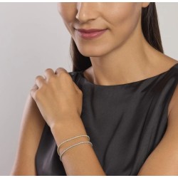 Pulsera fina de tenis en plata chapada en oro con circonitas.