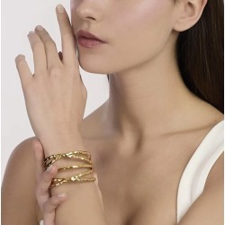 Brazalete rígido de acero dorado