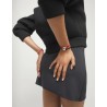 Pulsera de hilo elástico negro con corazón bañado en plata de ley