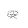 Pulsera semirrígida bañada en plata con perlas y estrella de mar