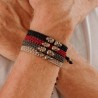 Pulsera de nylon granate con calaveras Fiorven 